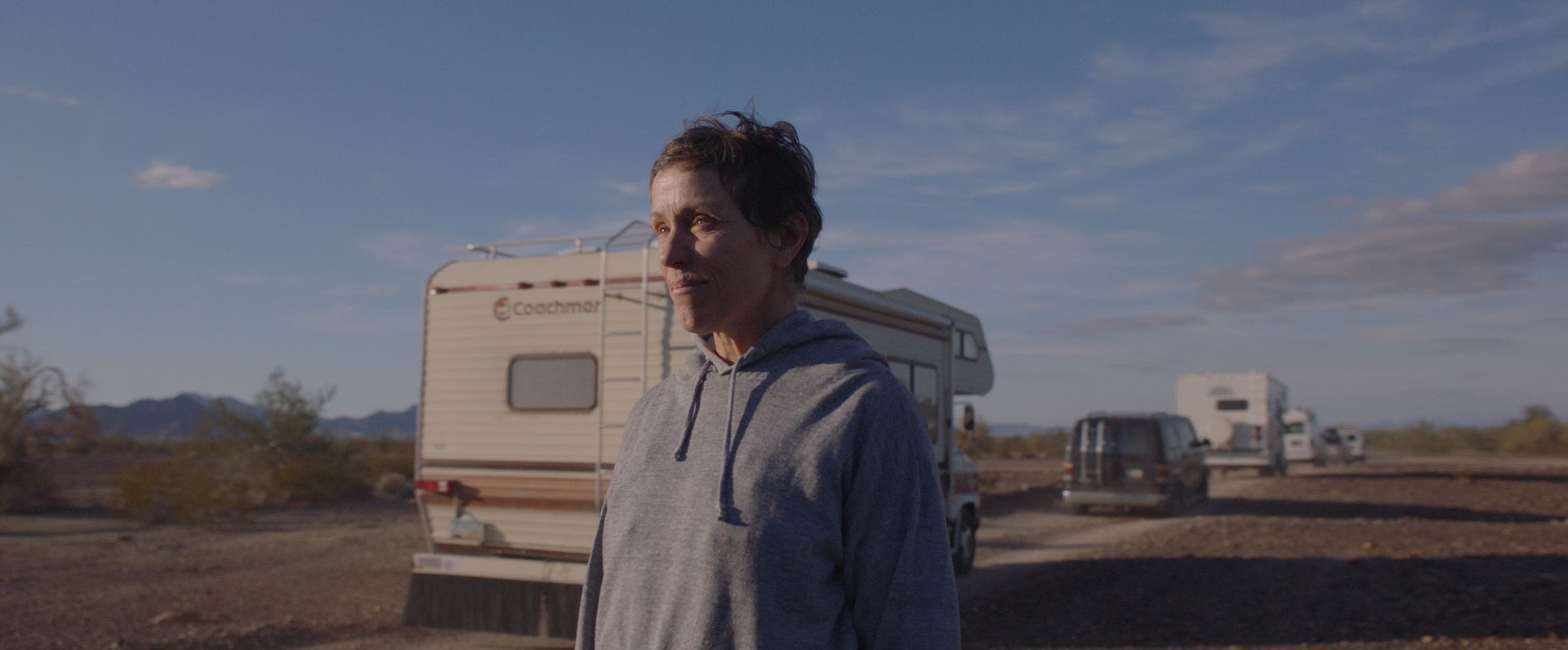 a man standing in a desert