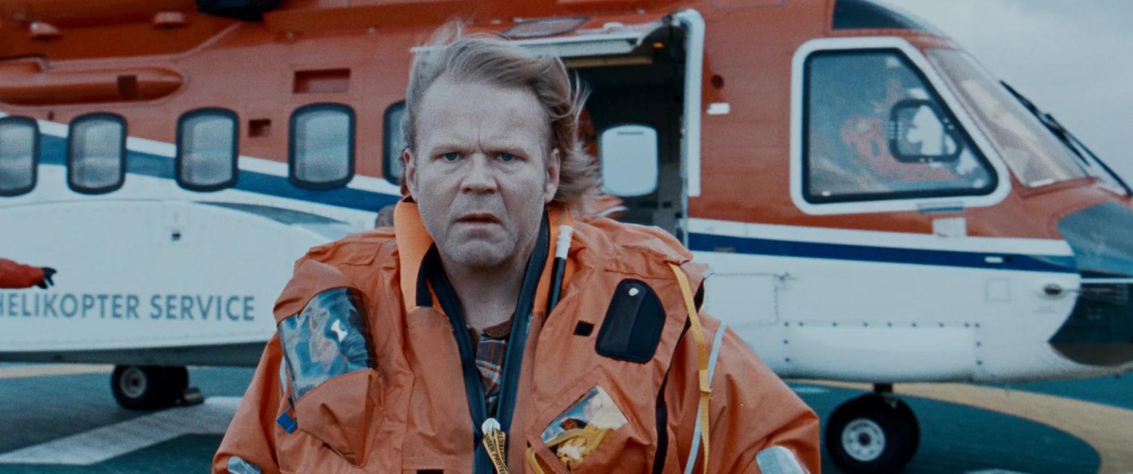 Anders Baasmo Christiansen in an orange jacket
