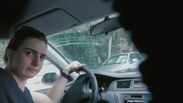 a person driving a car