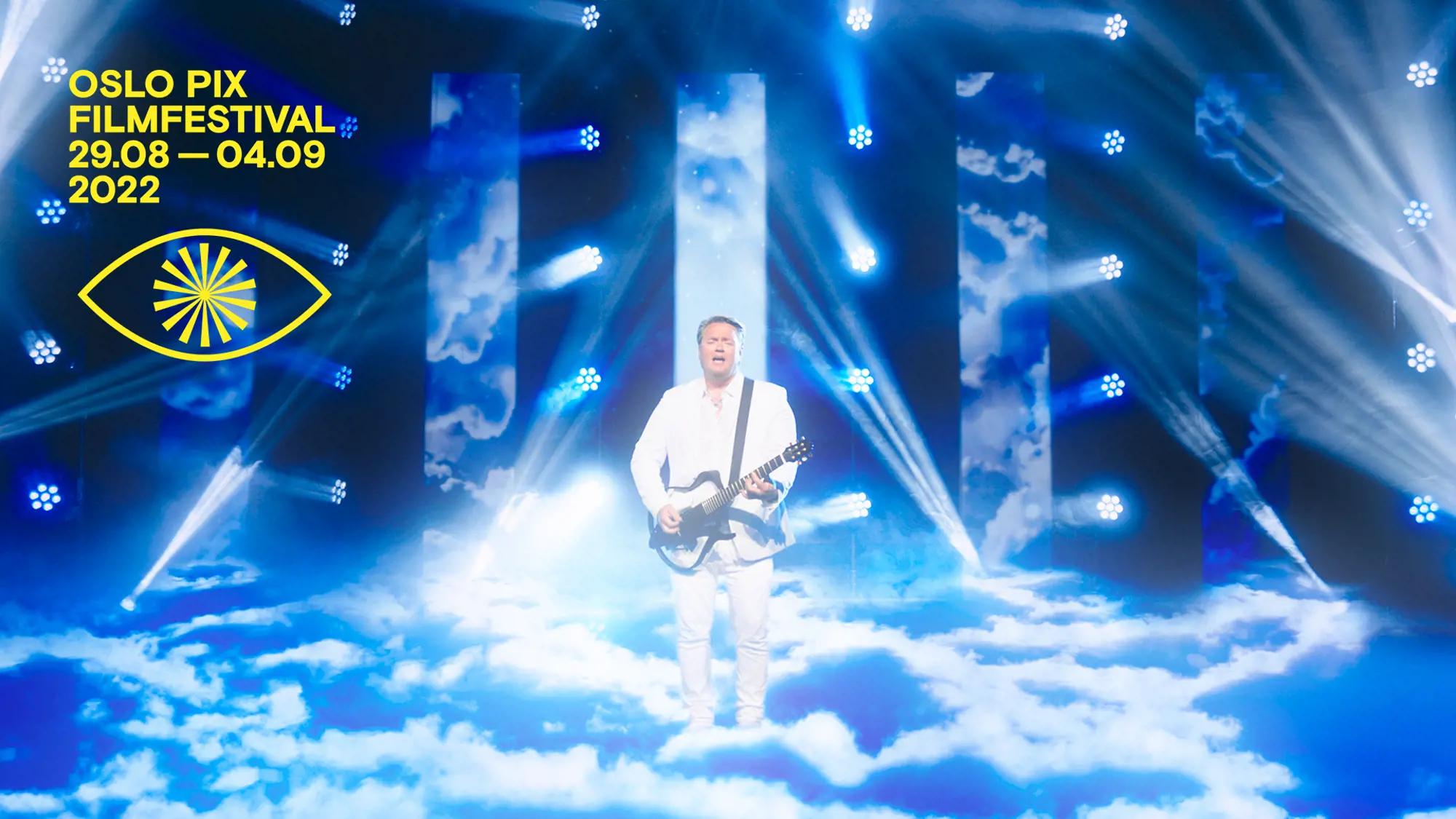 a person holding a guitar