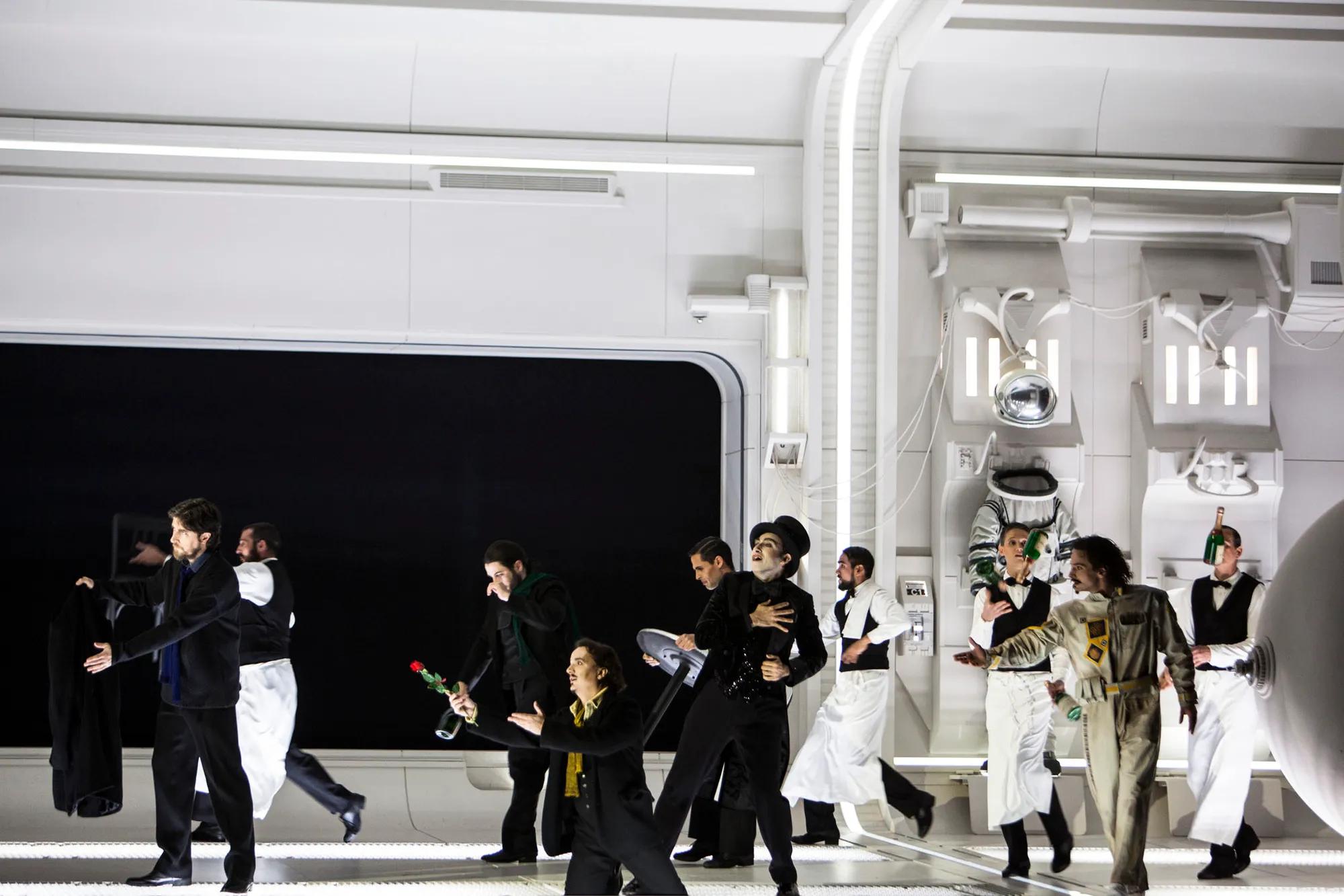 a group of people walking in a building