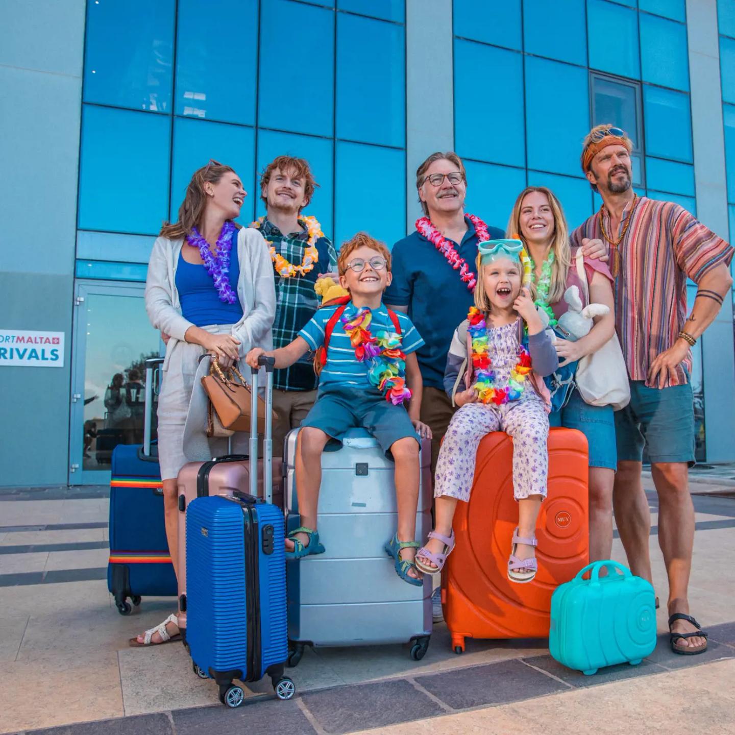 a group of people with luggage