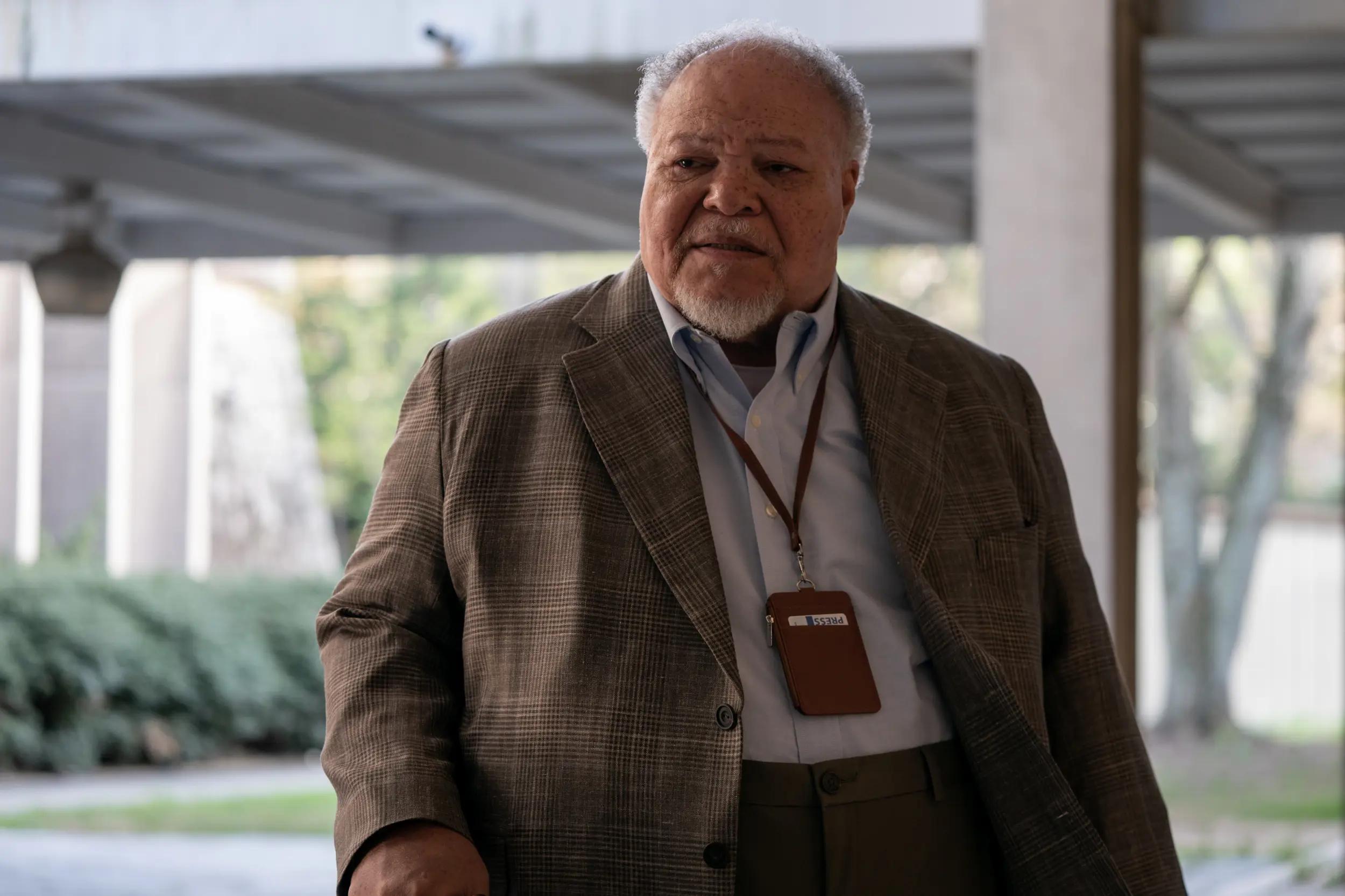 Stephen Henderson in a brown jacket