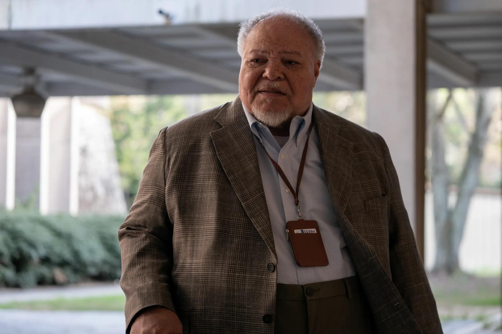 Stephen Henderson in a brown jacket