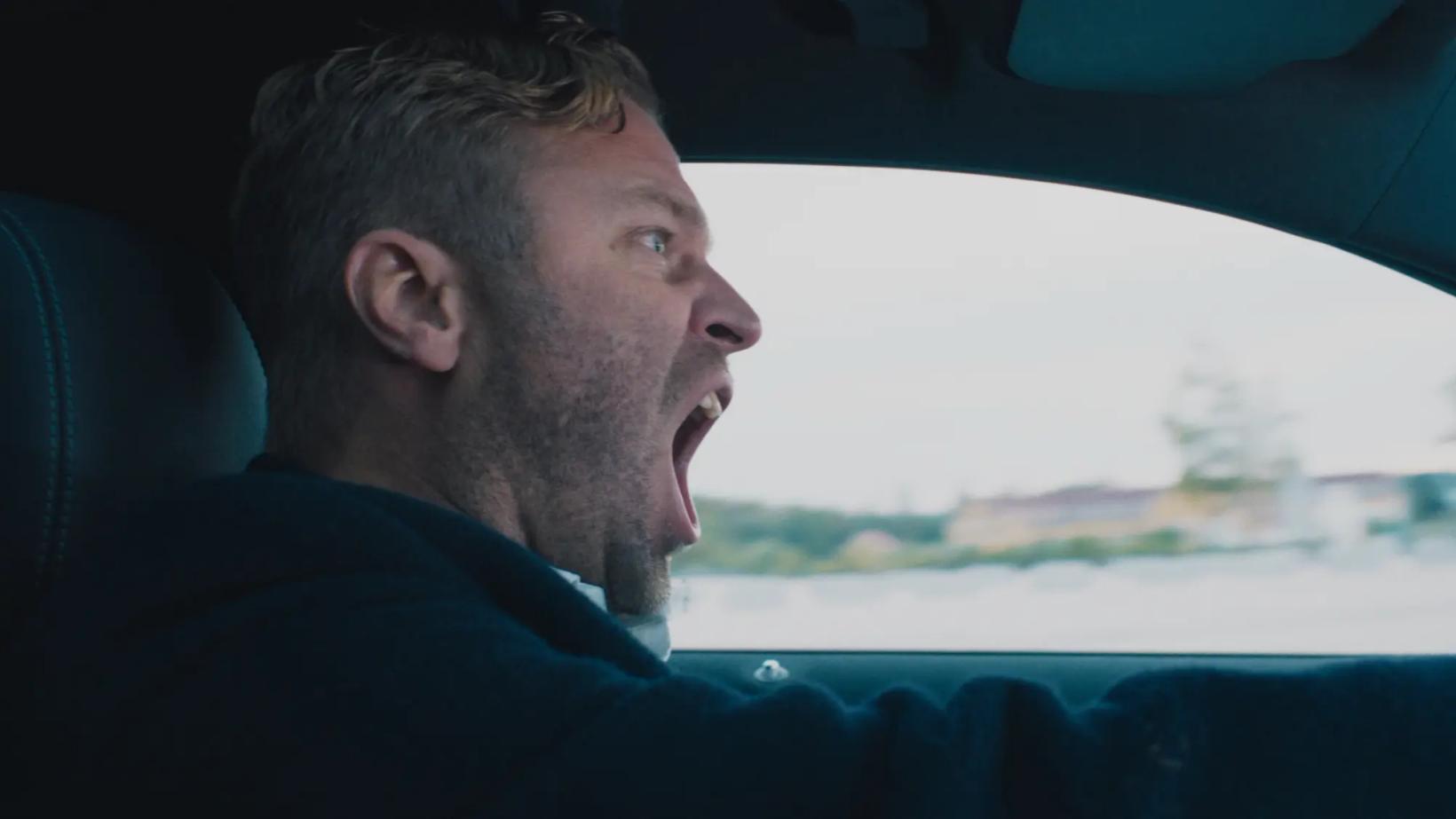 a man in a car