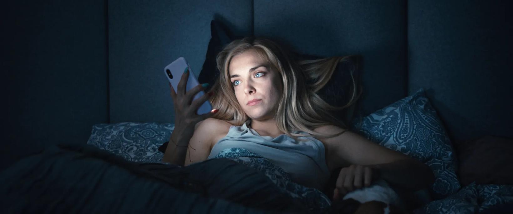 a woman lying on a bed