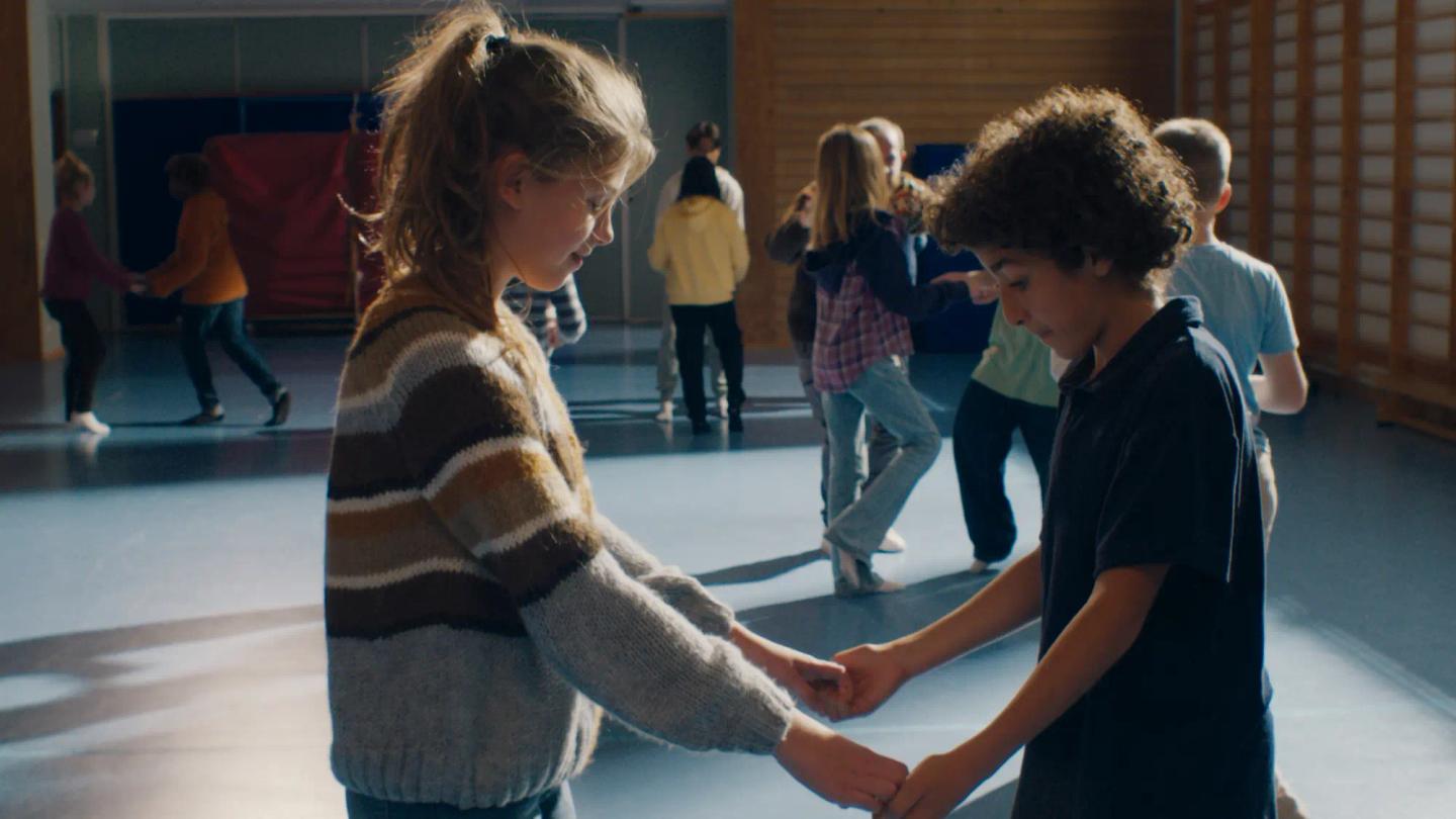 a person and a boy playing a game