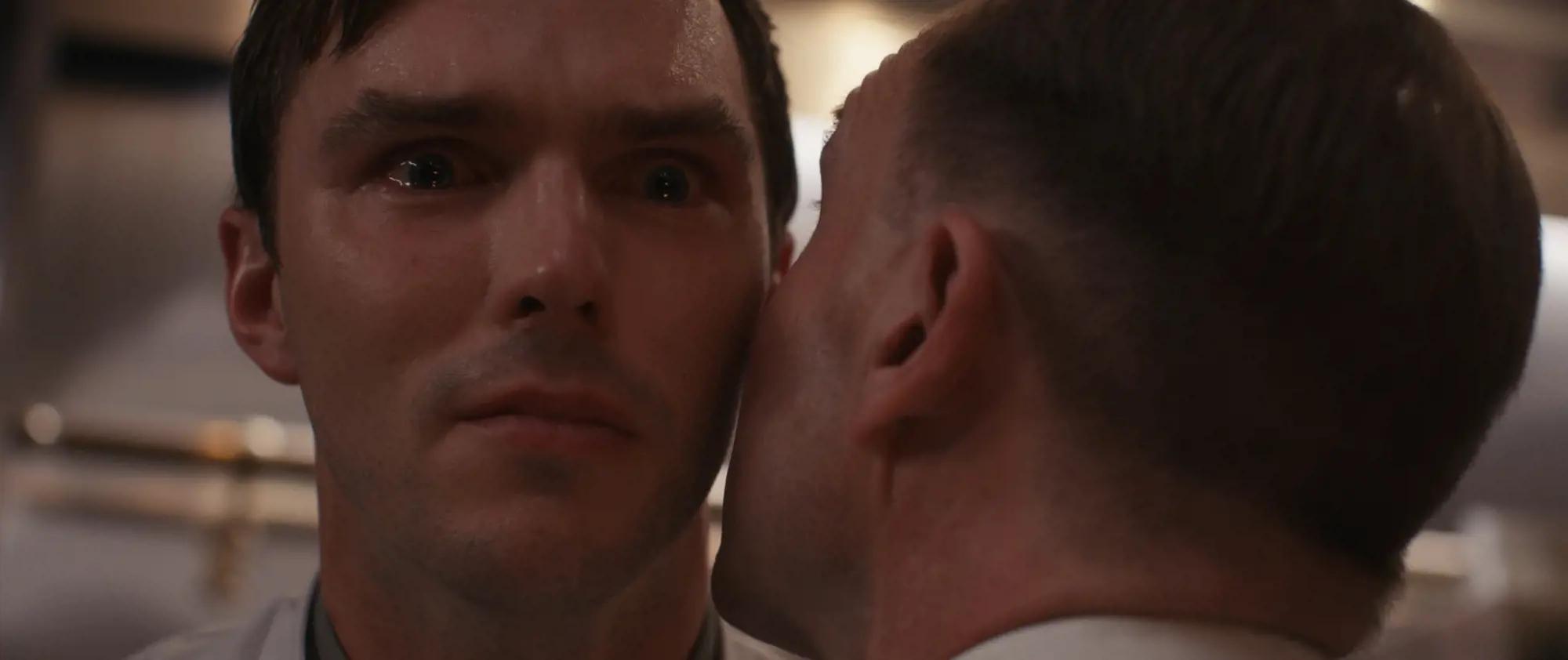 a man looking at another man