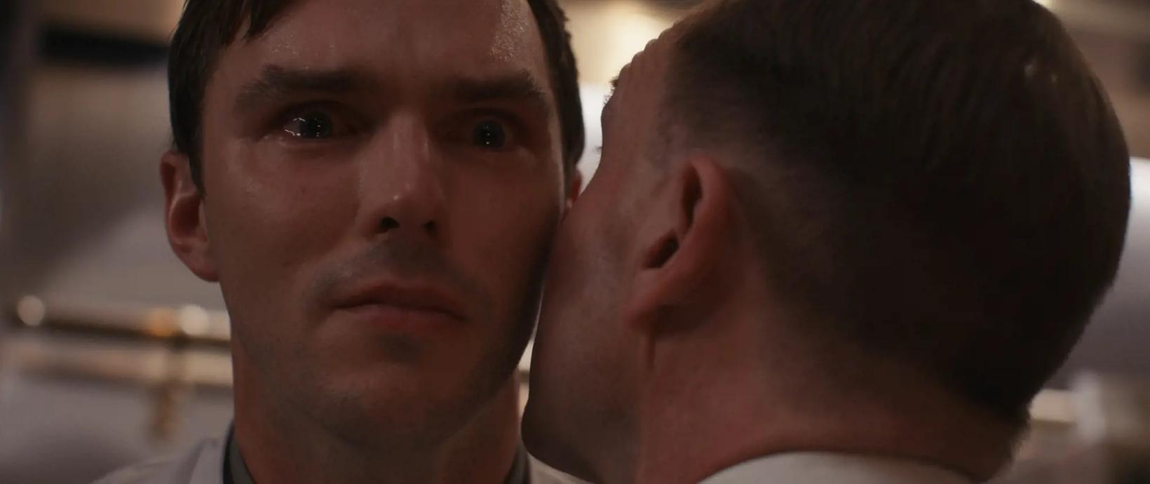 a man looking at another man