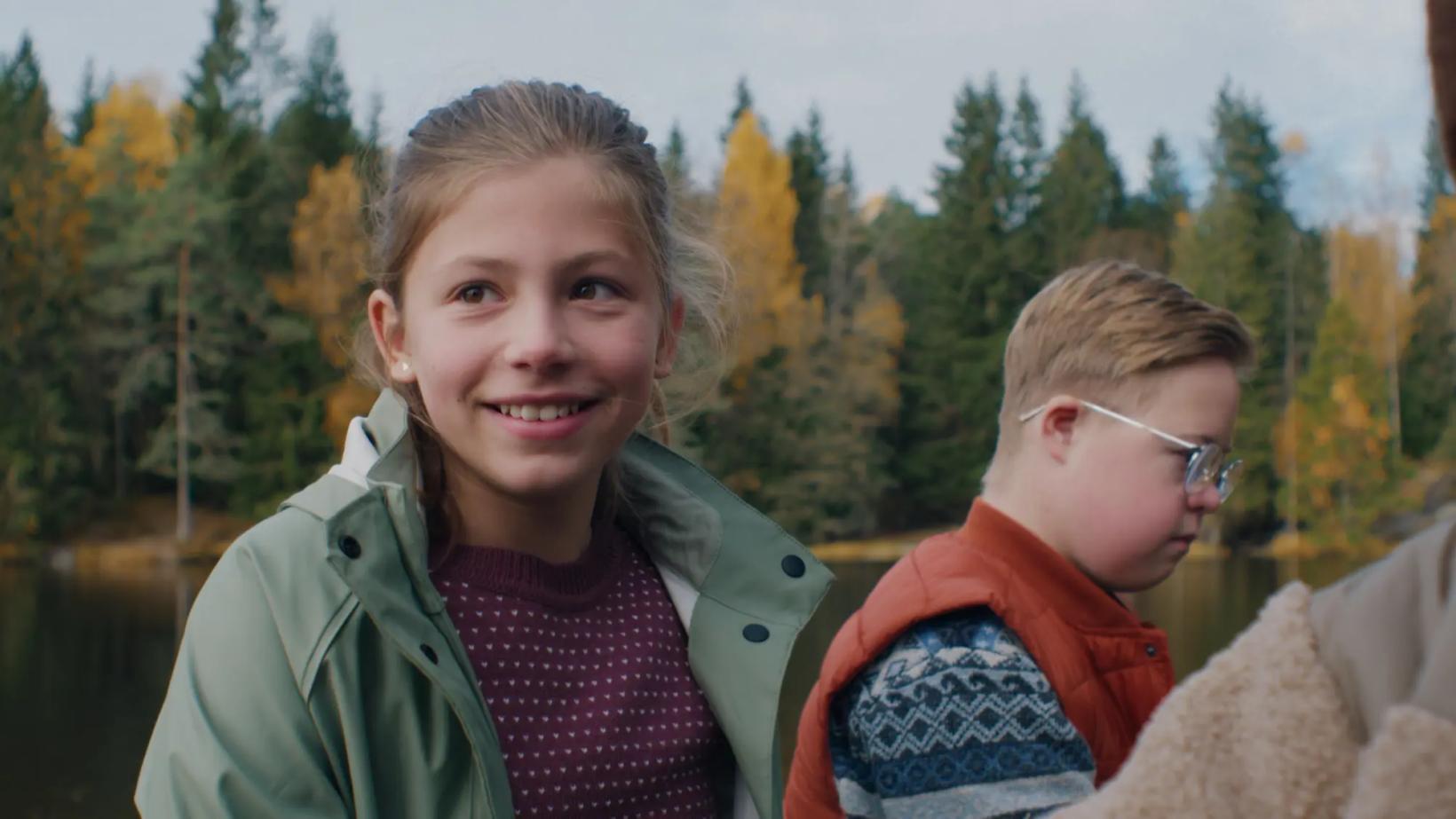 a person and a boy smiling