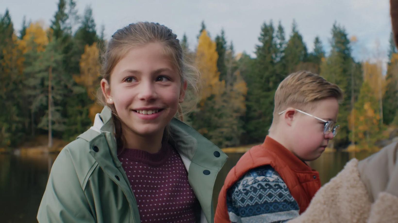 a person and a boy smiling