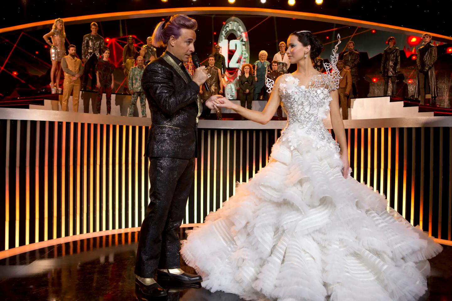 a man and woman dancing on a stage