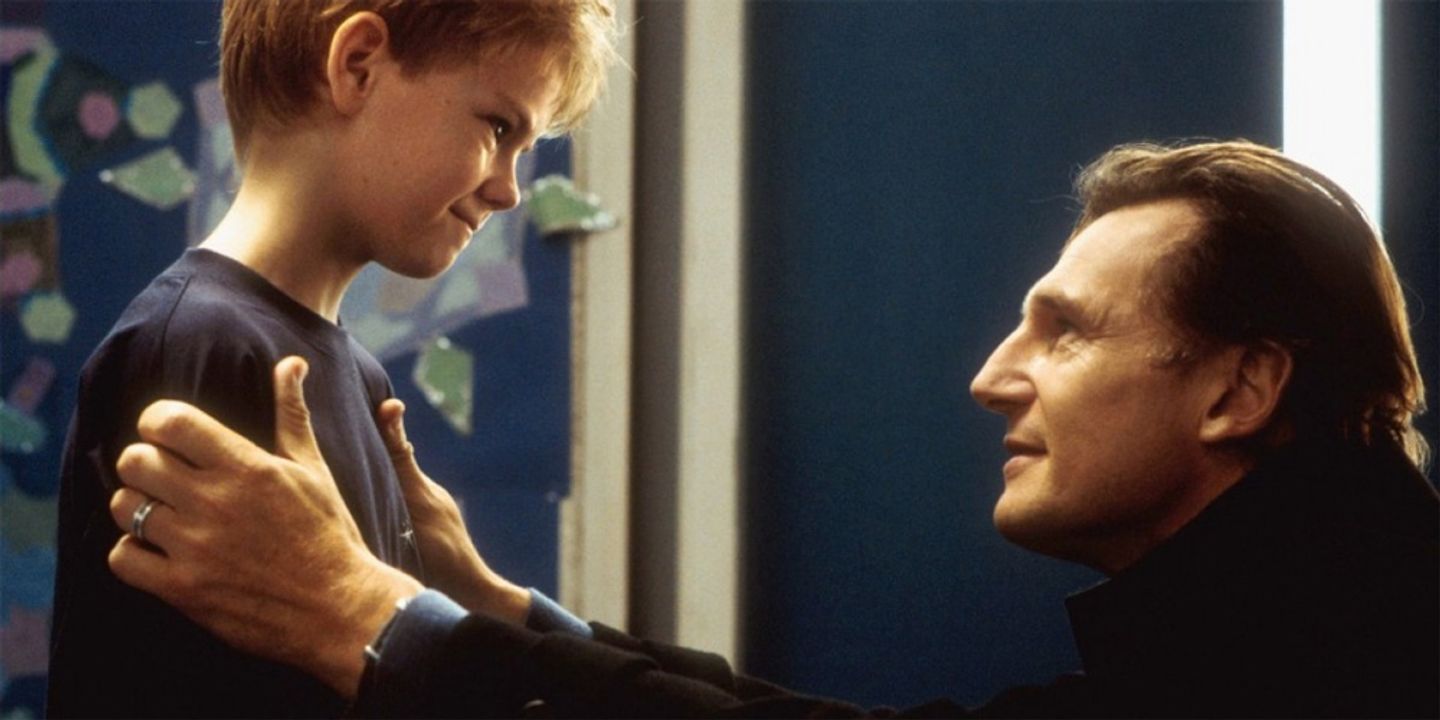 Liam Neeson as Daniel in Love Actually