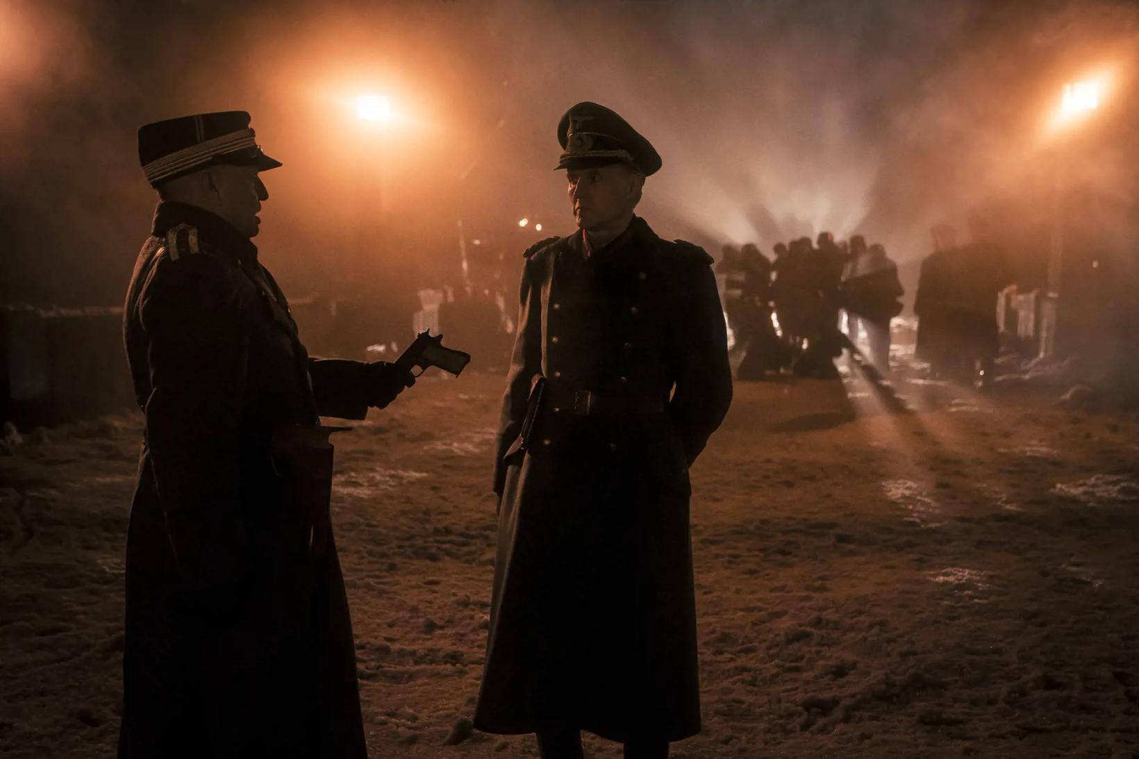 a couple of men in military uniforms