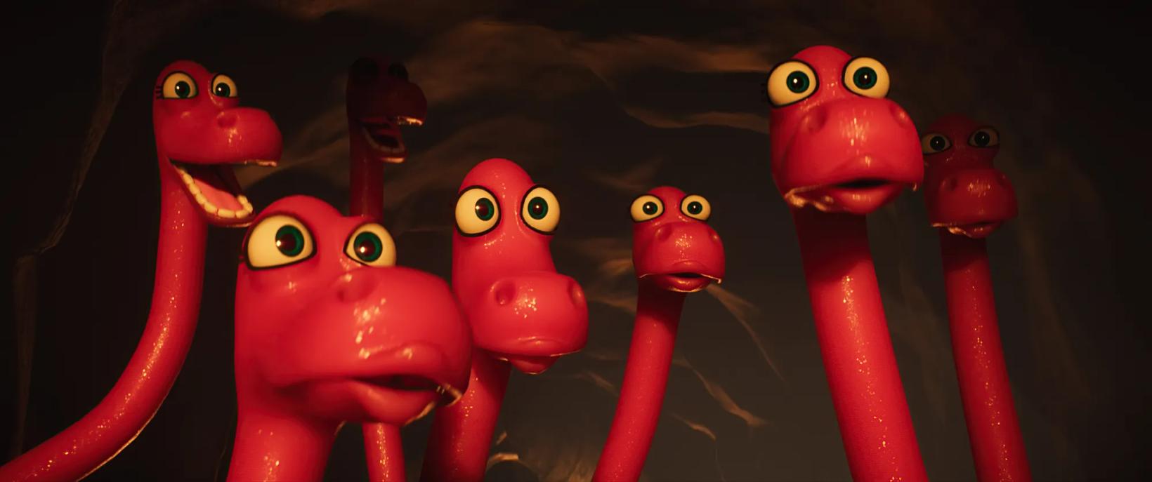 a group of red and black toy animals