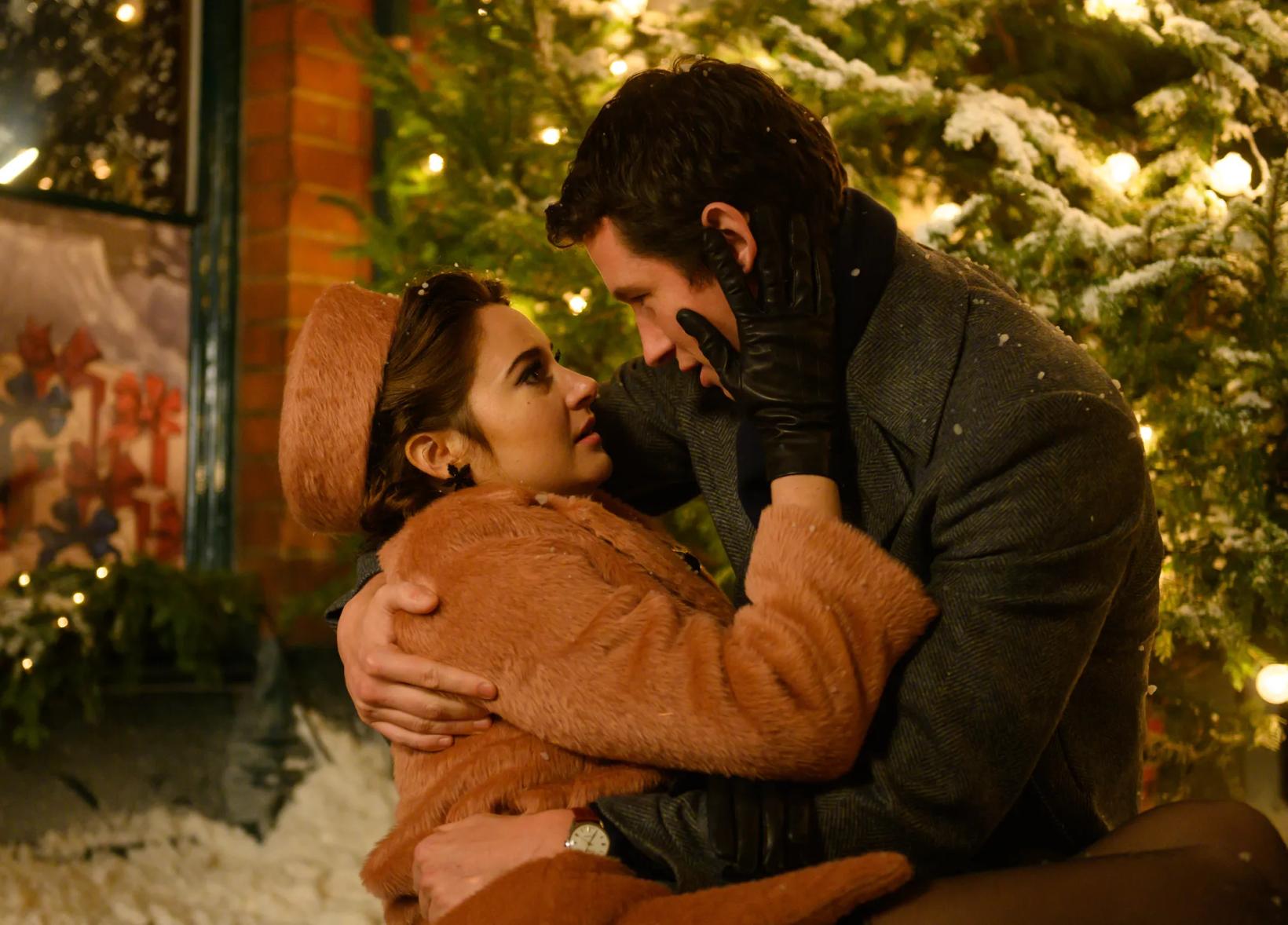 a man and woman kissing