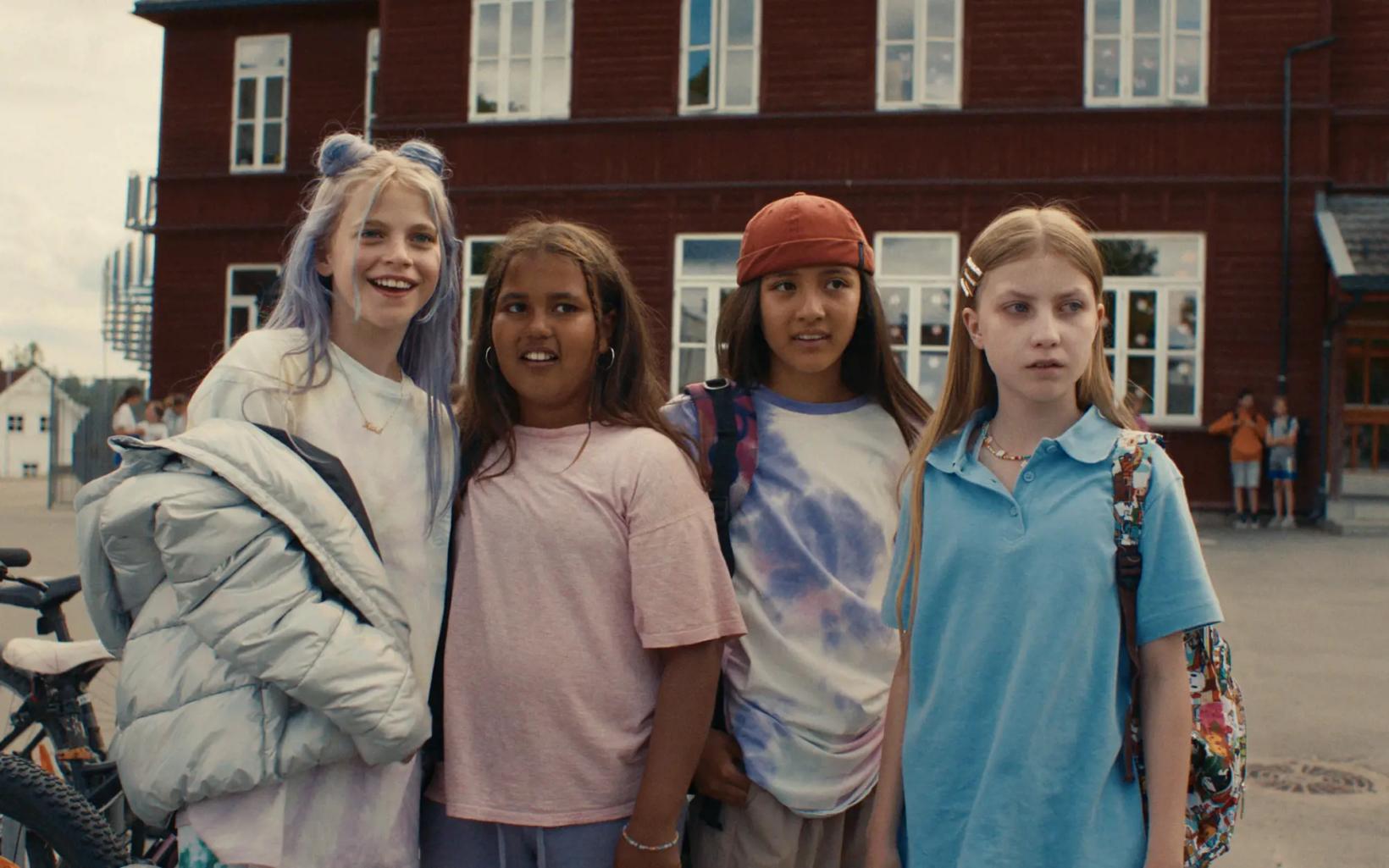 a group of women posing for a photo