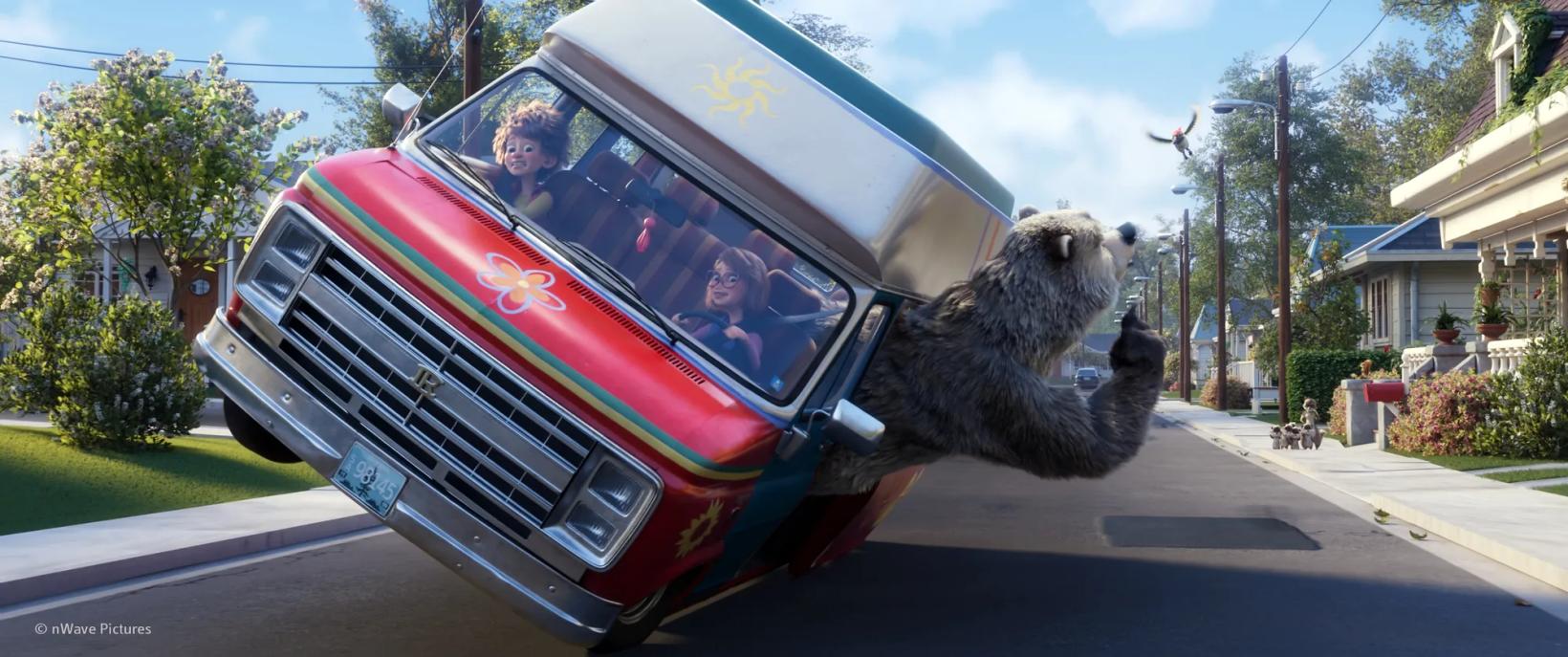 a person in a bear garment driving a car