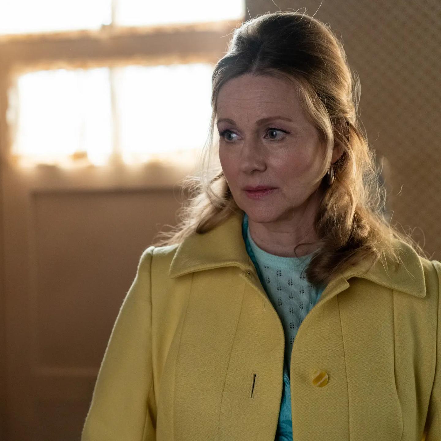 Laura Linney in a yellow jacket