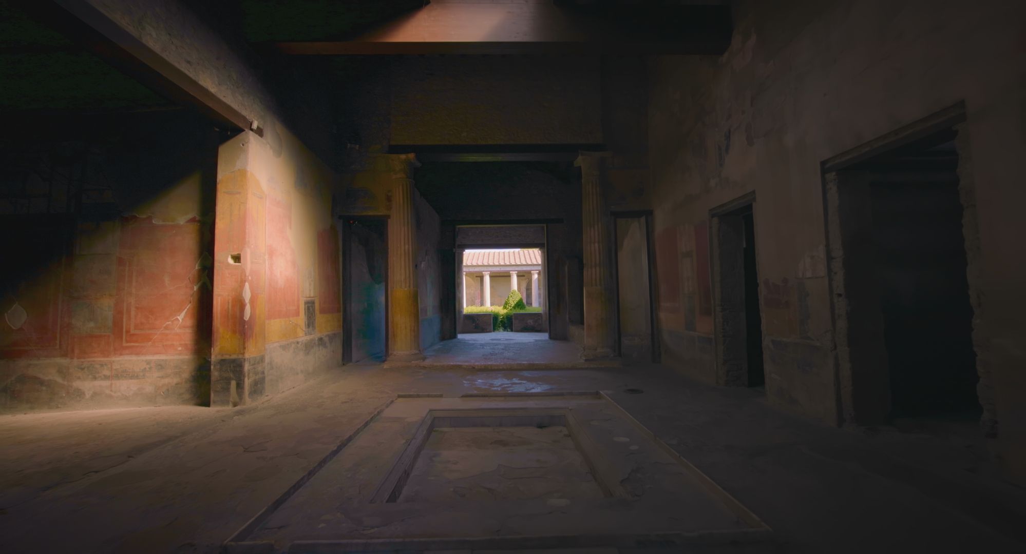 a room with a door and windows