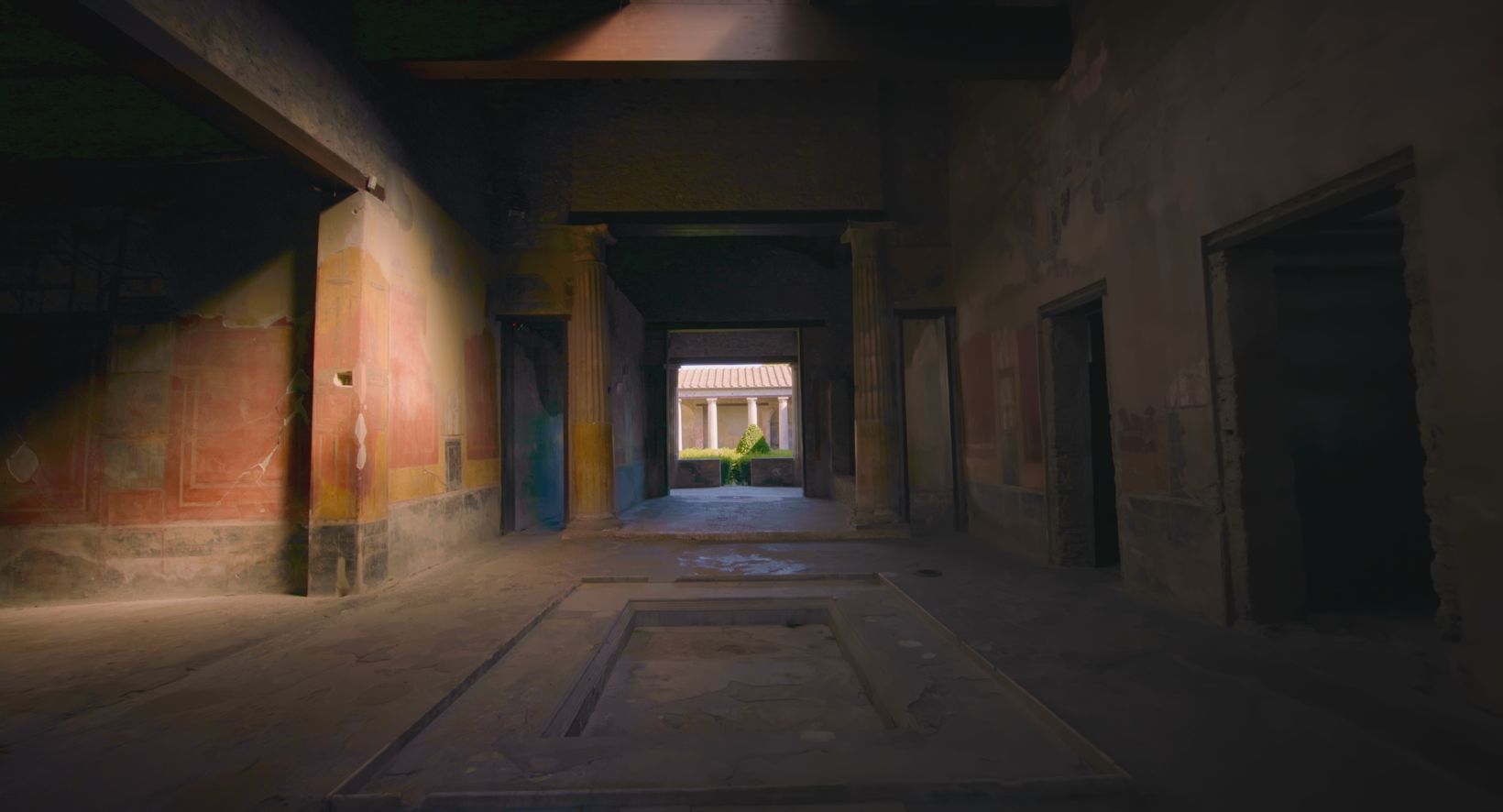 a room with a door and windows