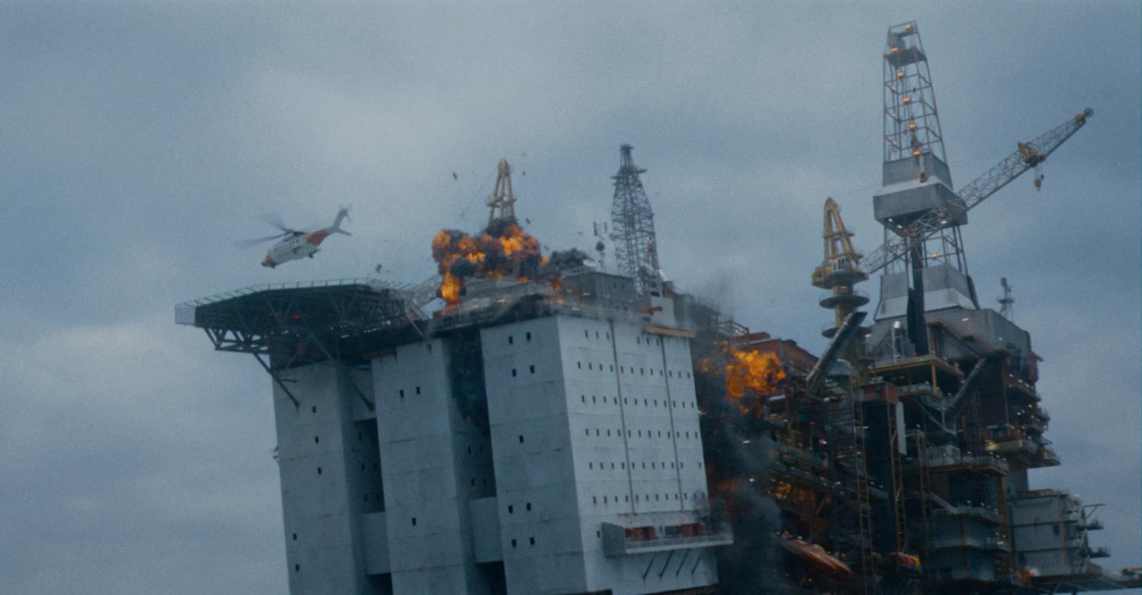 a plane flying over a large building