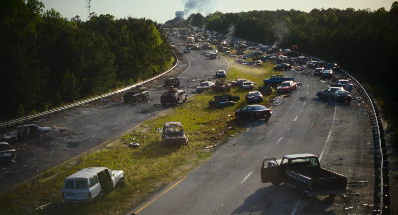 a highway with cars on it