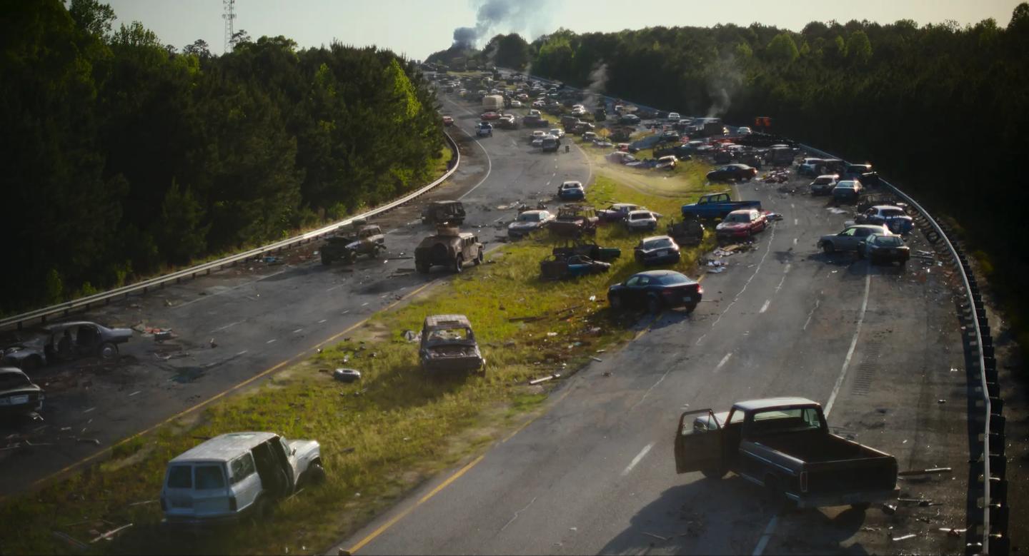 a highway with cars on it
