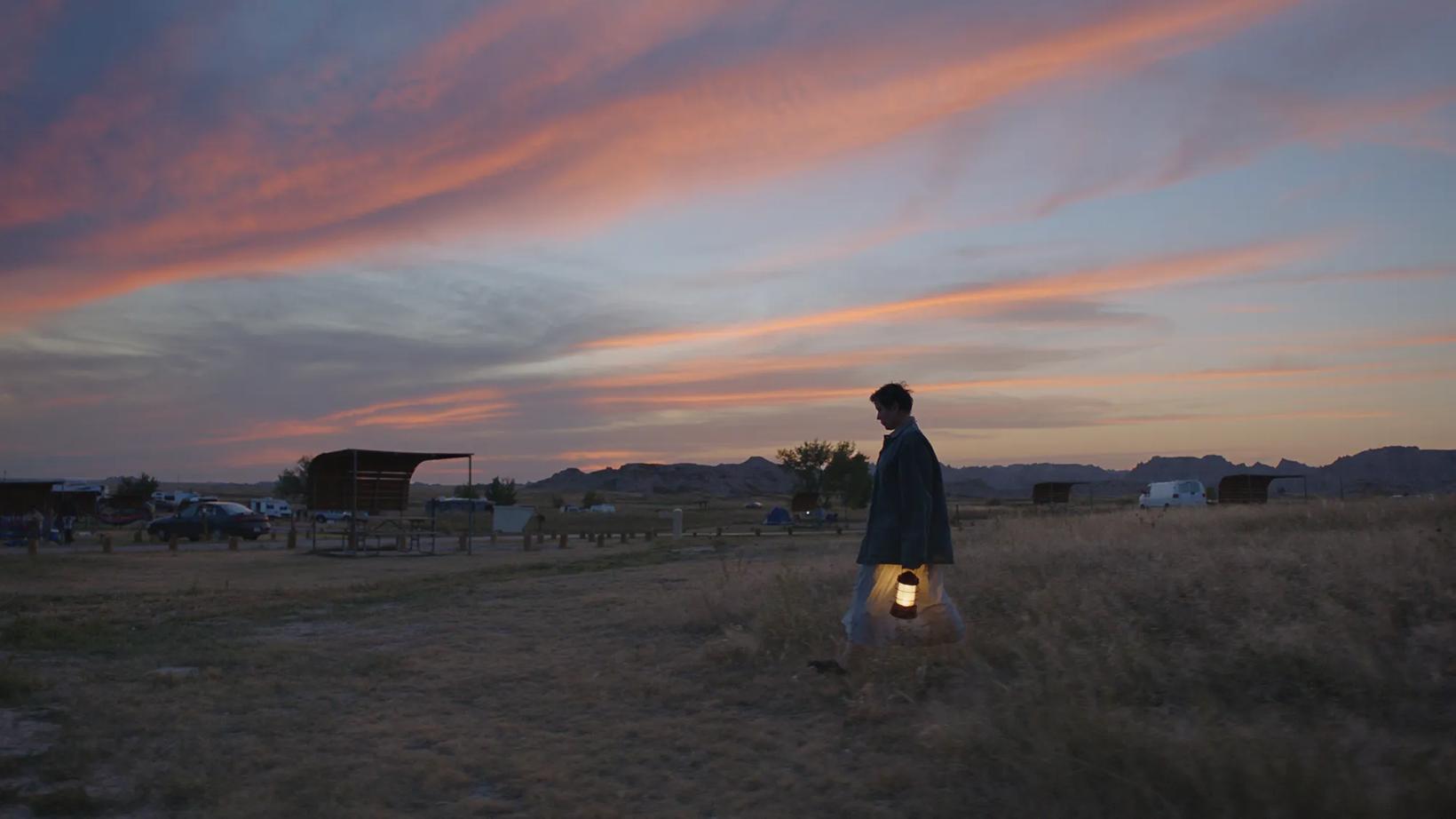 a man walking in a field