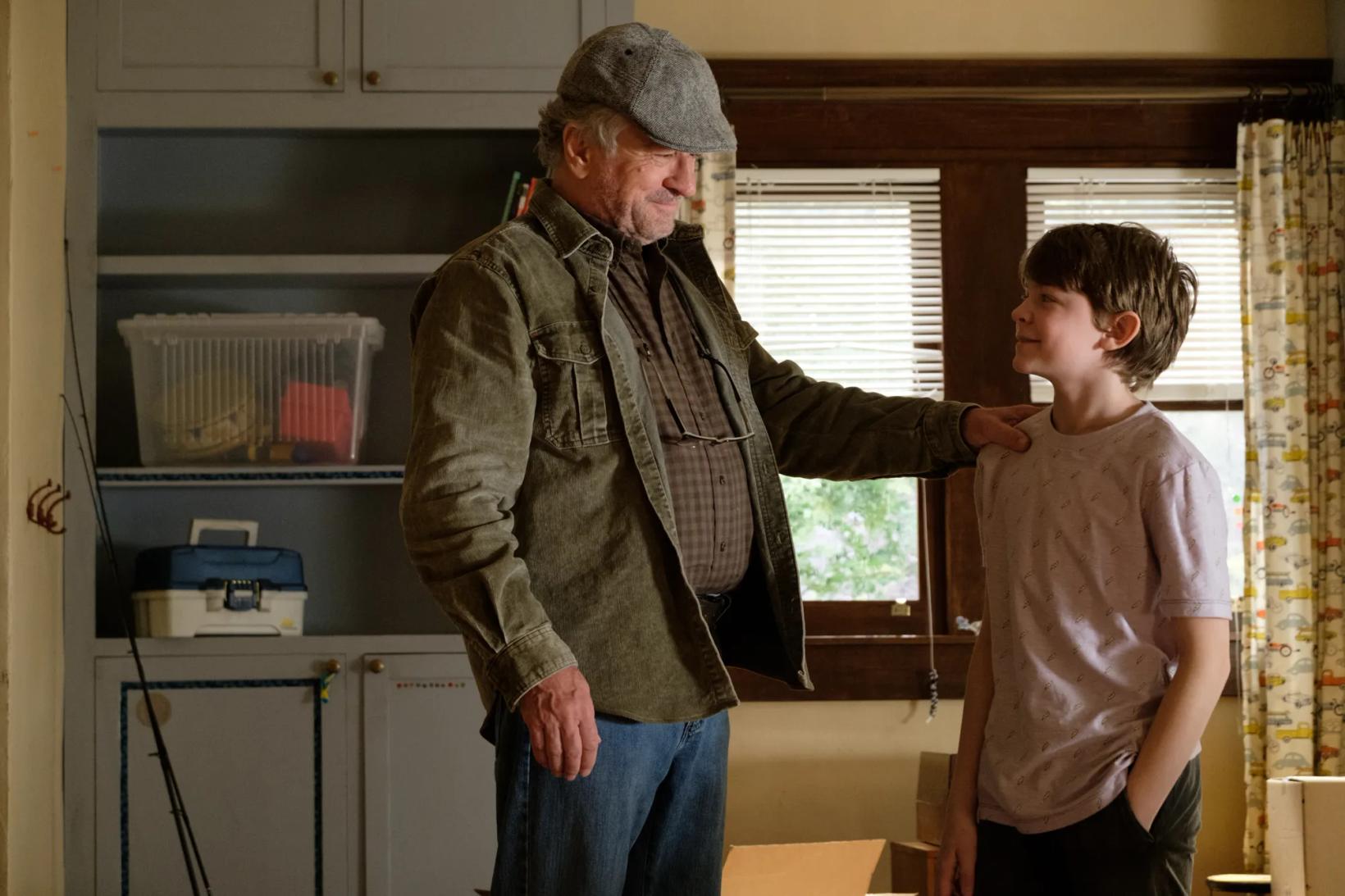 a man and a boy in a kitchen