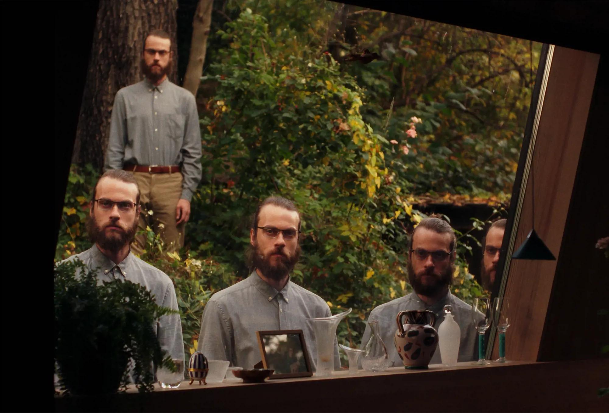 a group of men posing for a picture