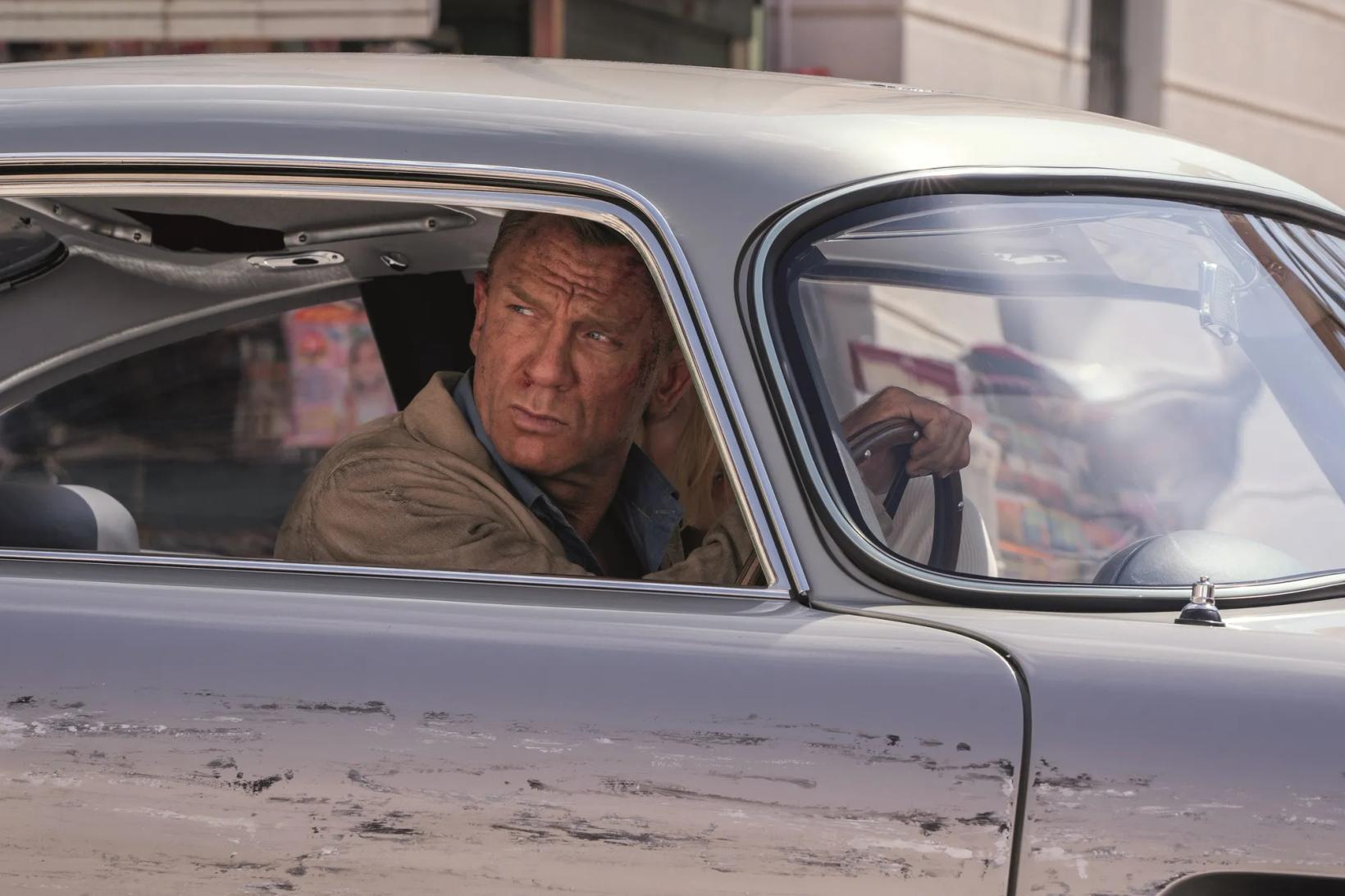 Daniel Craig in a car