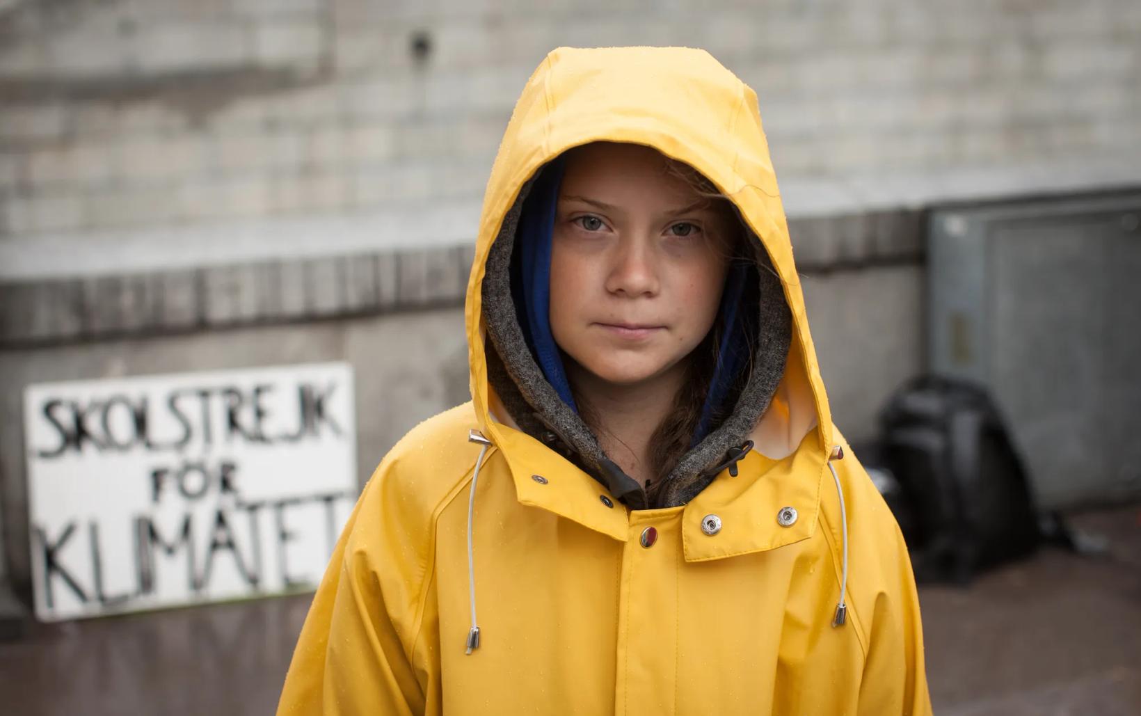 a person wearing a yellow raincoat