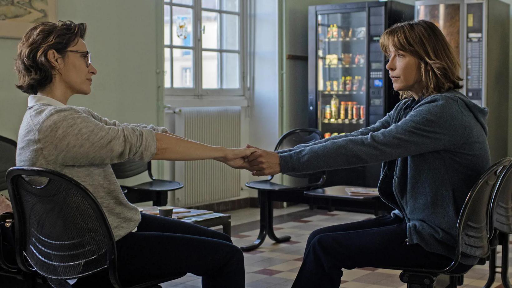 a person shaking hands with a person