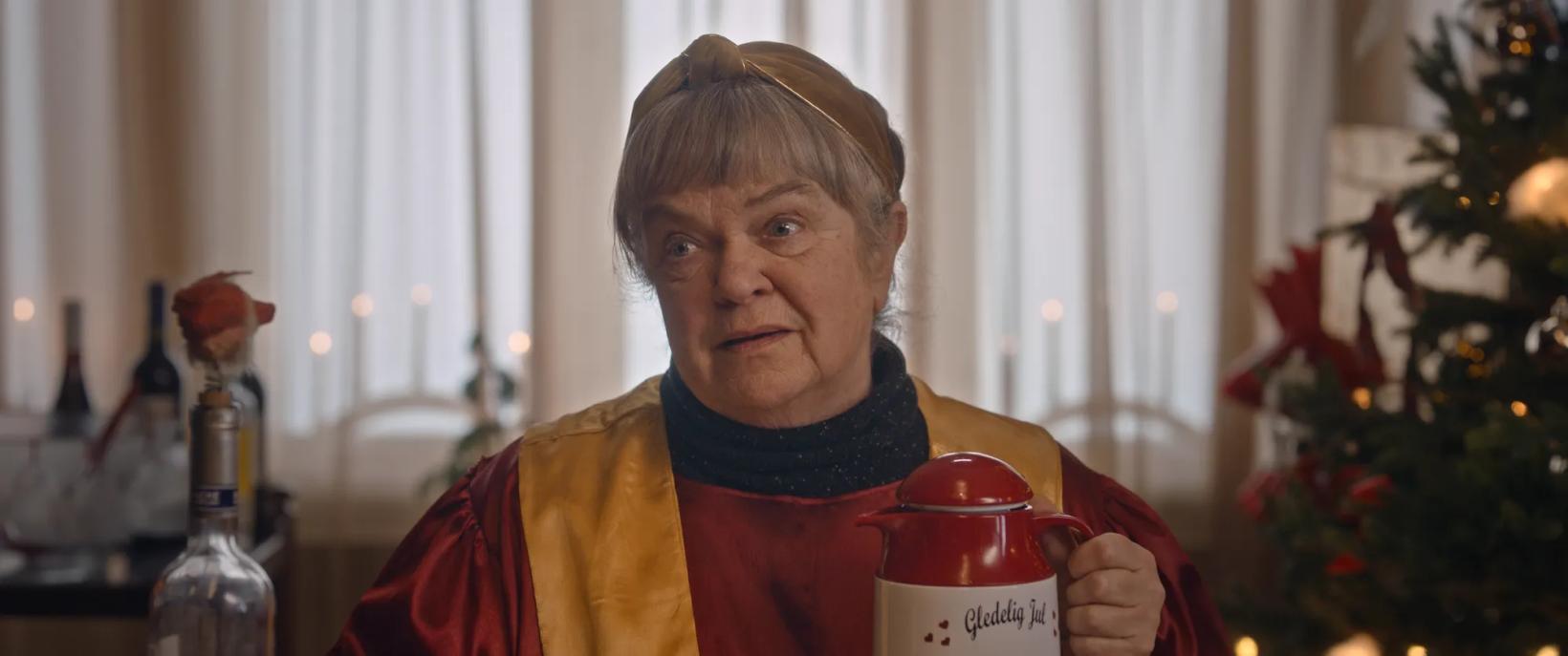 a person holding a bottle