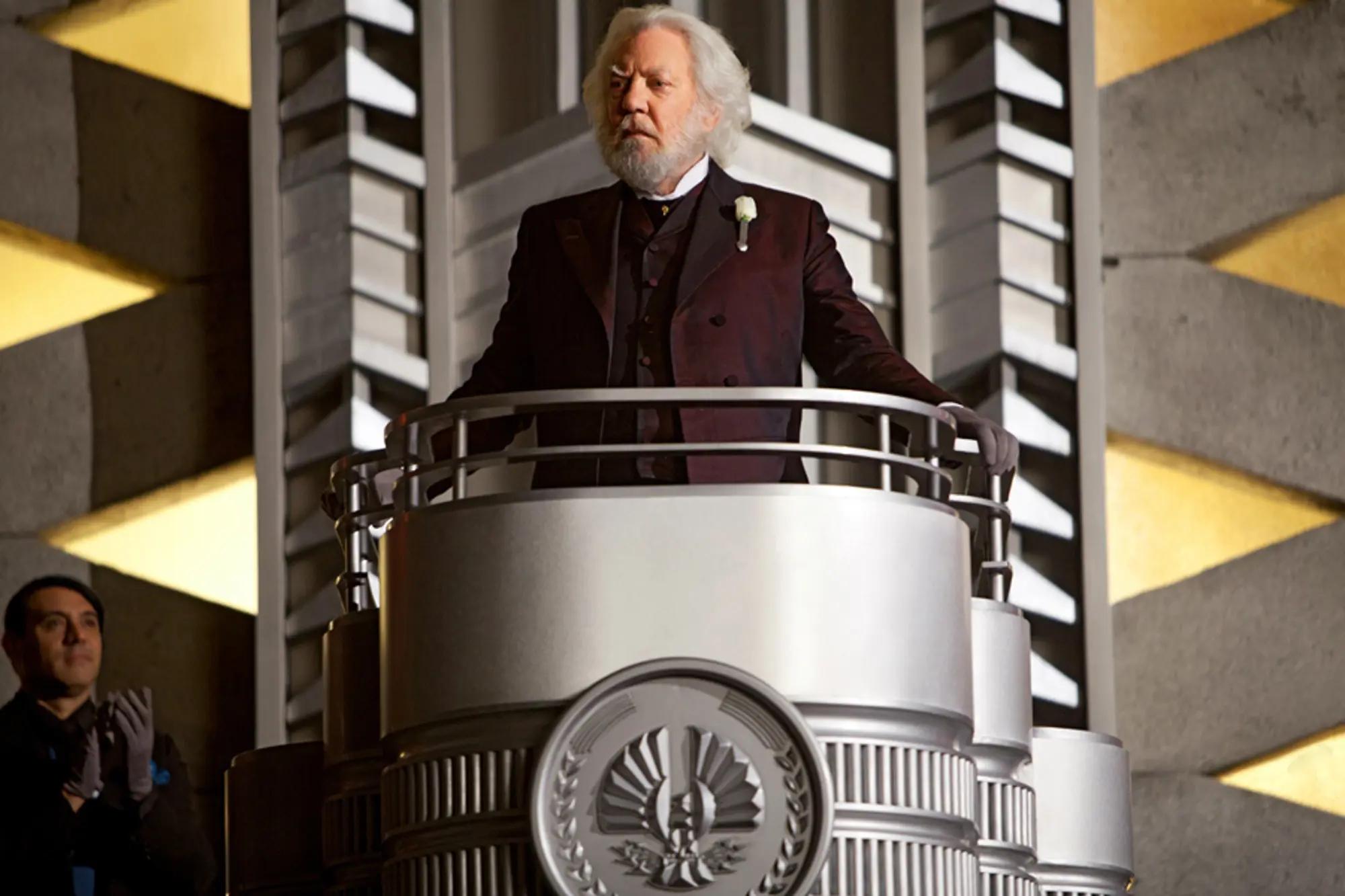 Donald Sutherland standing at a podium