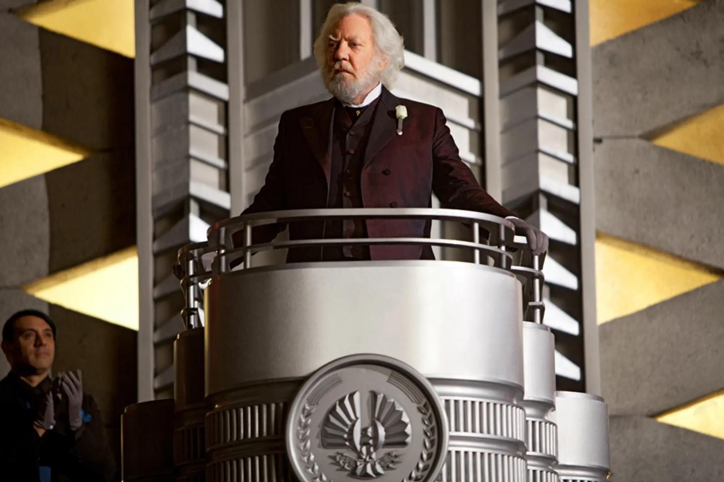 Donald Sutherland standing at a podium