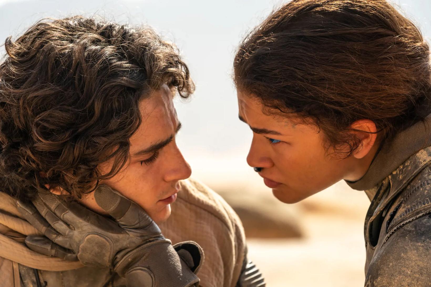 a man and a woman looking at each other