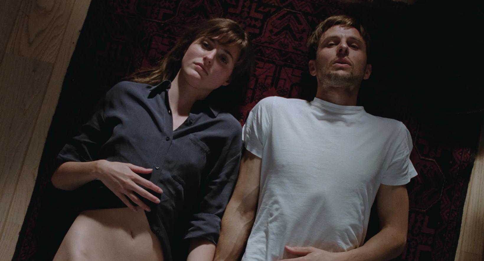 a man and woman posing for a picture