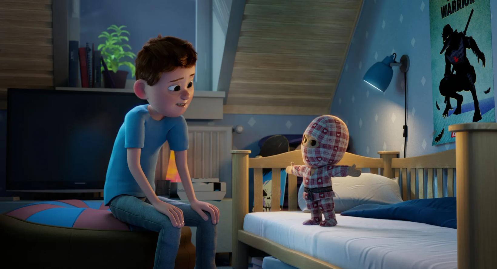 a boy sitting on a bed