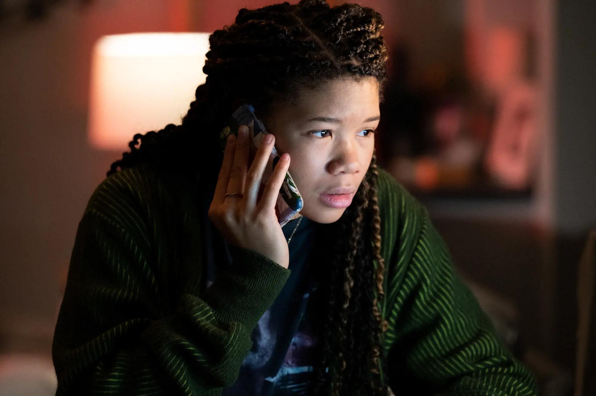 Storm Reid talking on a cell phone