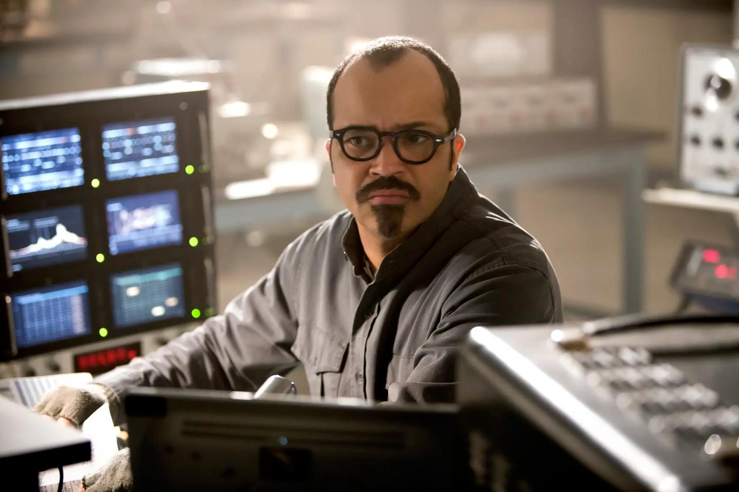 Jeffrey Wright sitting in front of a computer