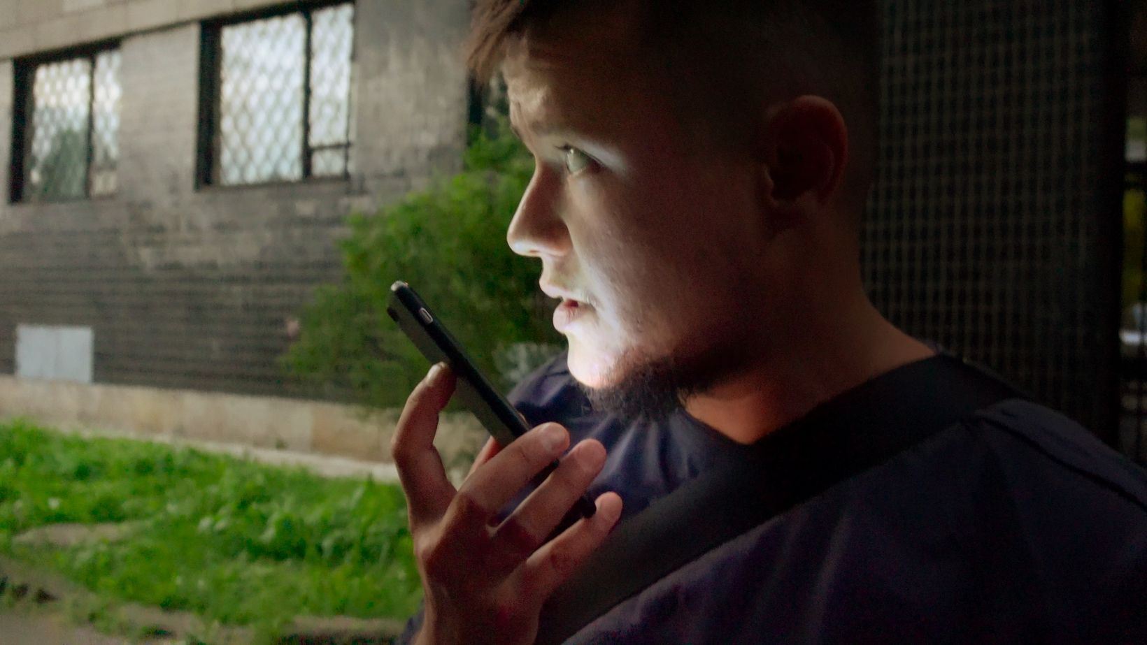 a man talking on a cell phone