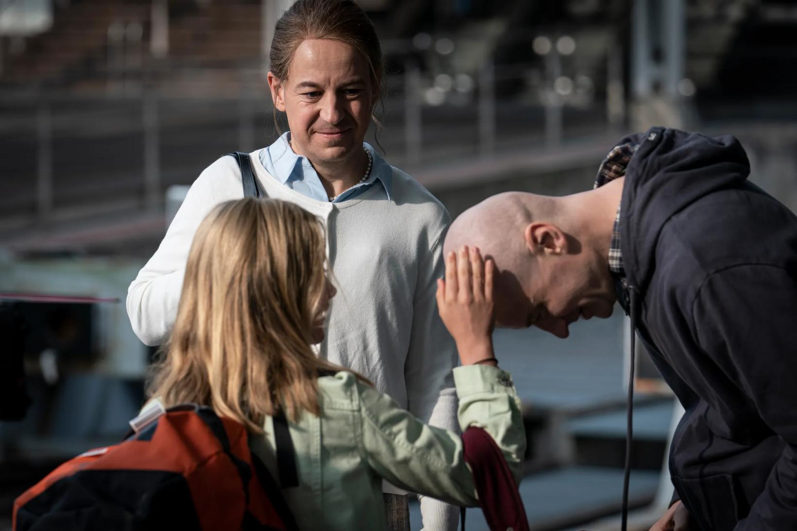 a man holding a woman