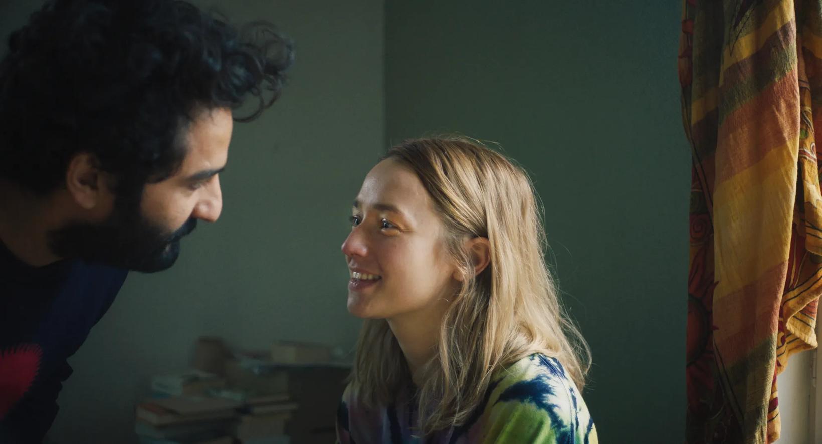 a man and a woman talking