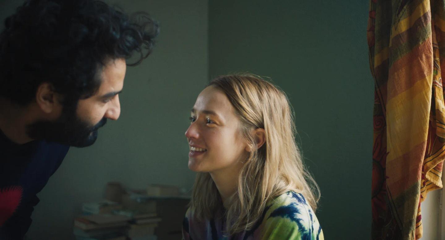 a man and a woman talking