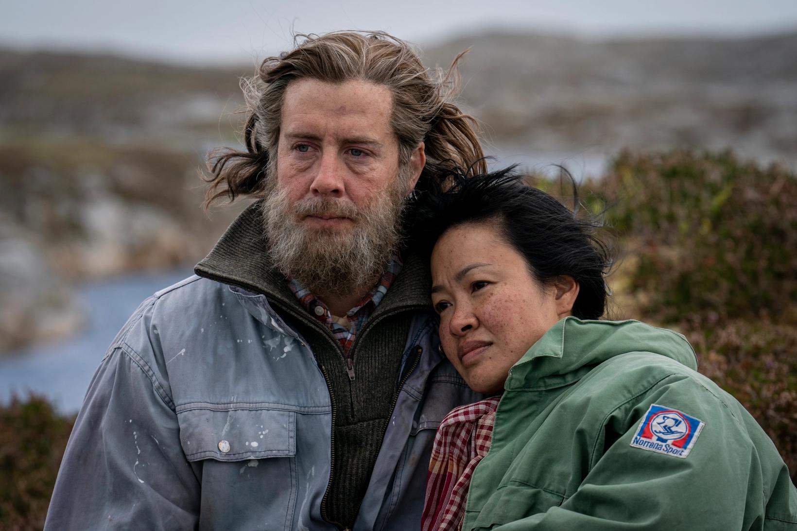 a man and a woman posing for a photo