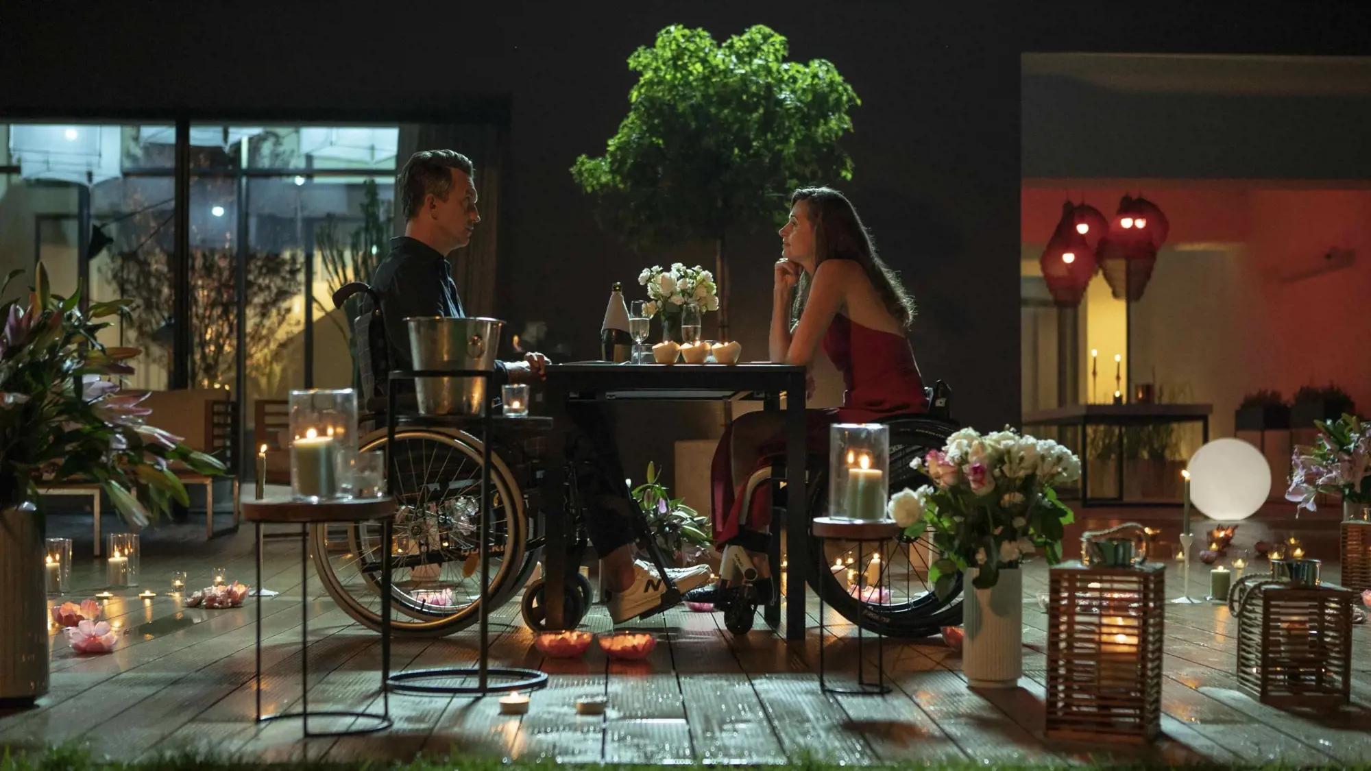 a man and woman playing piano