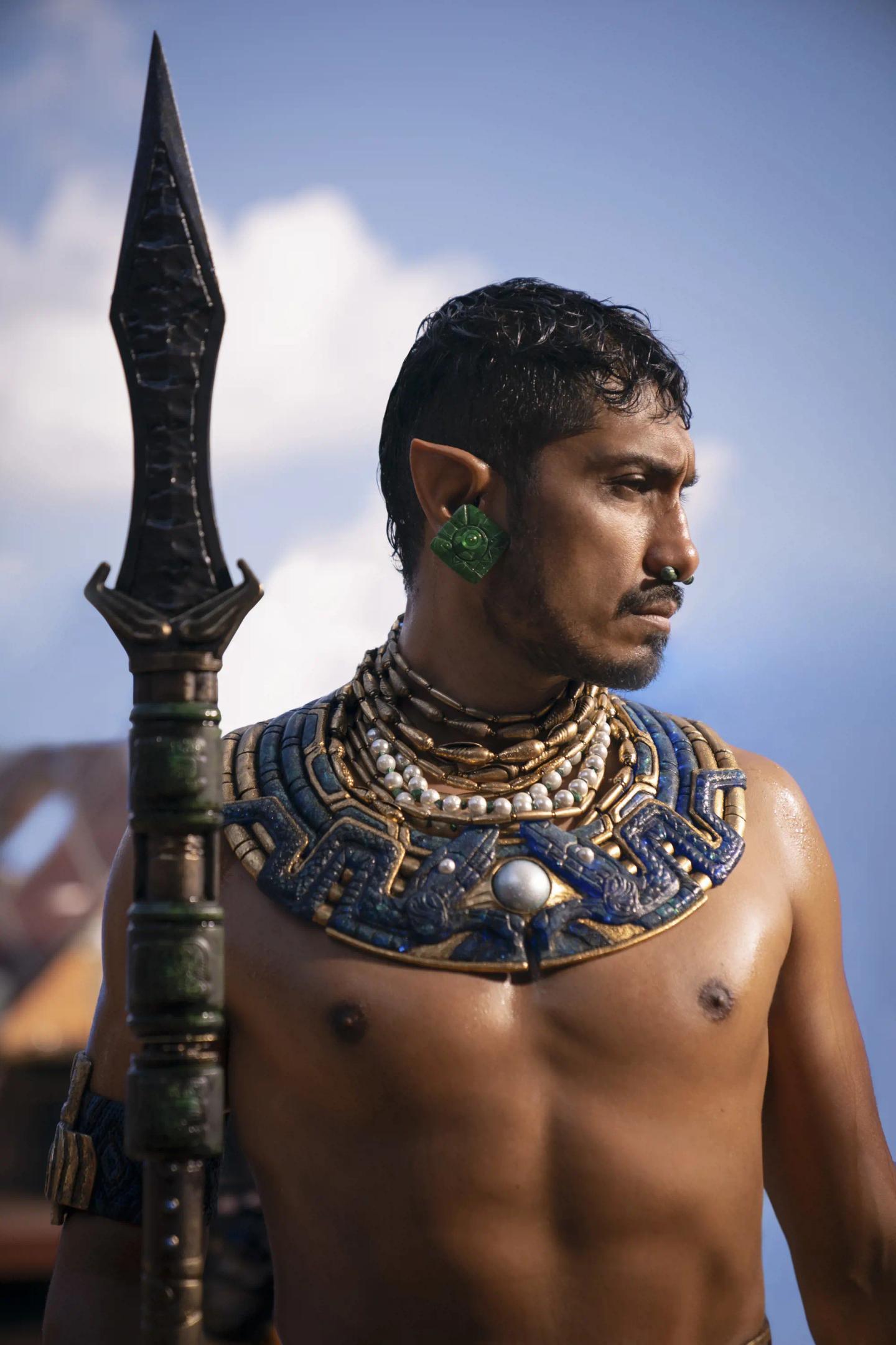a man with a tattoo on his neck and a sword