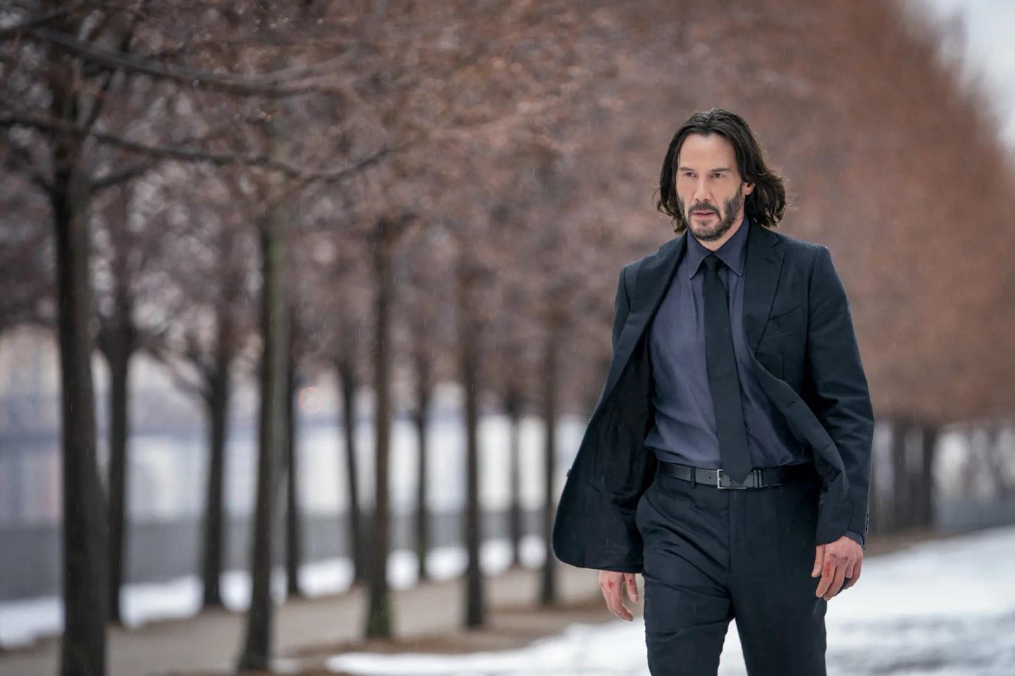 Keanu Reeves walking in the snow